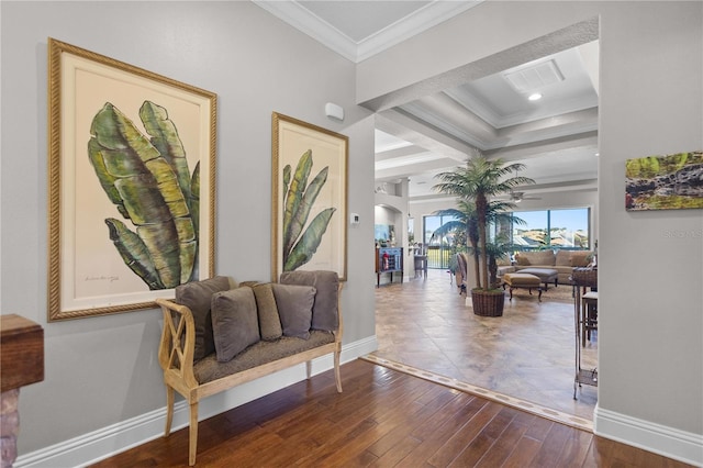 hall featuring hardwood / wood-style flooring and crown molding