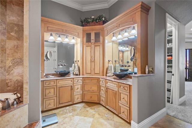 bathroom featuring vanity and crown molding