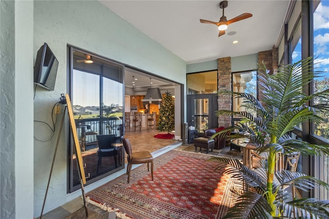 interior space featuring ceiling fan