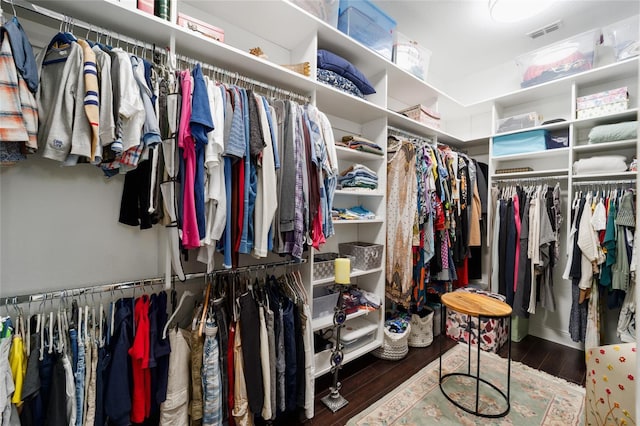 spacious closet with visible vents and wood finished floors