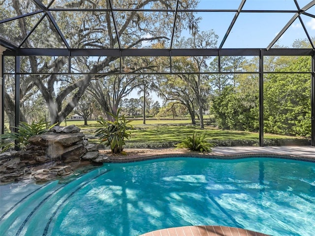 outdoor pool featuring a lanai