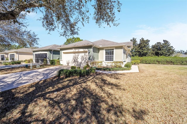 view of front of property featuring stucco siding, concrete driveway, a front yard, a garage, and stone siding