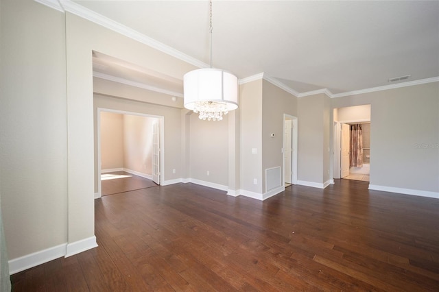 interior space with ornamental molding, visible vents, dark wood finished floors, and baseboards