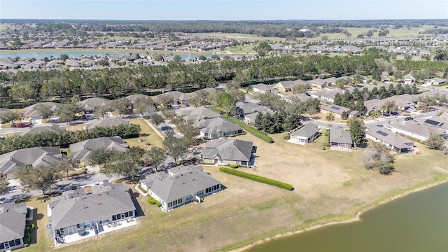 aerial view with a residential view and a water view