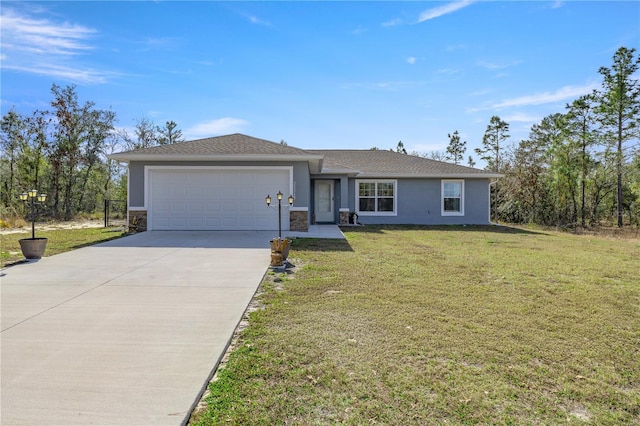 ranch-style home with a garage and a front yard