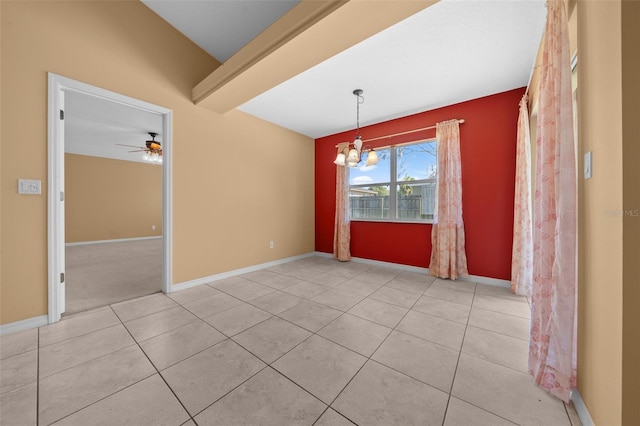 spare room featuring light tile patterned floors, baseboards, and ceiling fan with notable chandelier