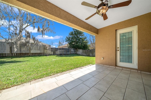 view of patio / terrace with ceiling fan and a fenced backyard