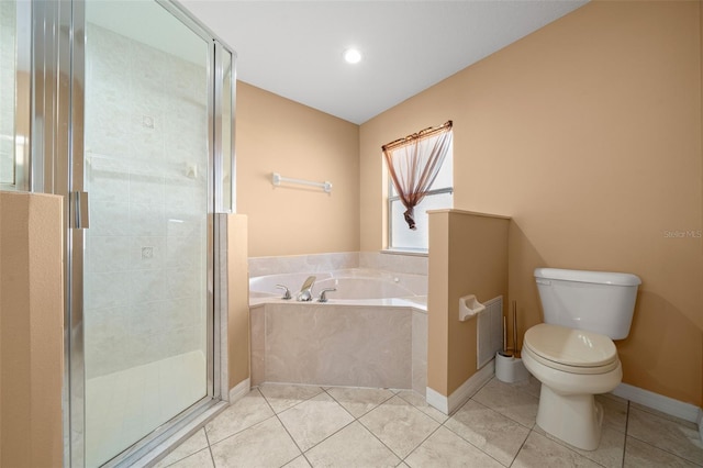 full bathroom featuring a stall shower, baseboards, toilet, tile patterned flooring, and a bath