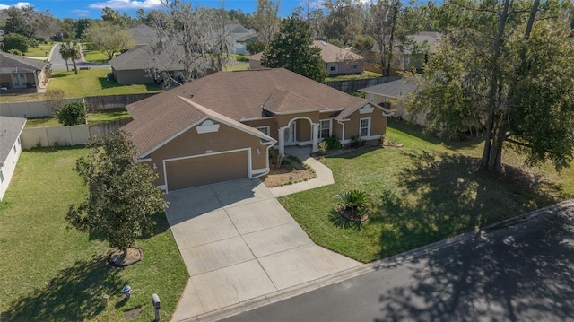 birds eye view of property with a residential view