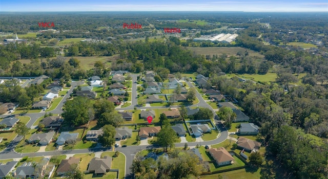 birds eye view of property with a residential view