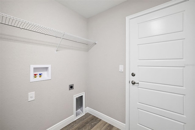laundry area with hookup for a washing machine, hookup for an electric dryer, laundry area, dark wood-style flooring, and baseboards
