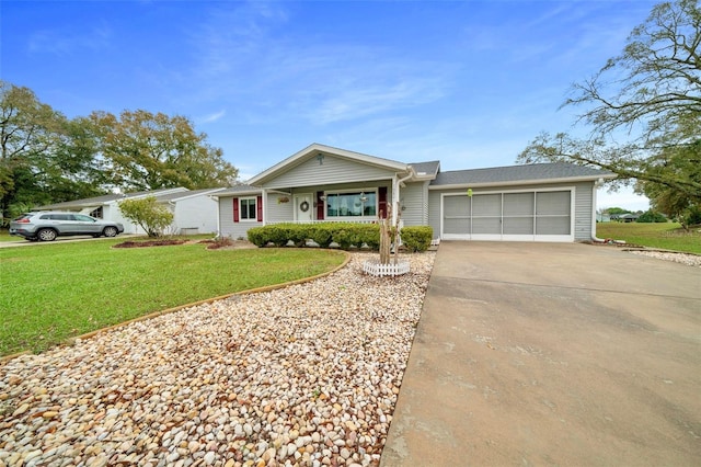 ranch-style house featuring driveway, a front lawn, and an attached garage