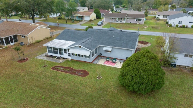 drone / aerial view with a residential view