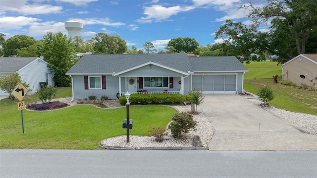 ranch-style house with driveway, covered porch, a garage, and a front yard