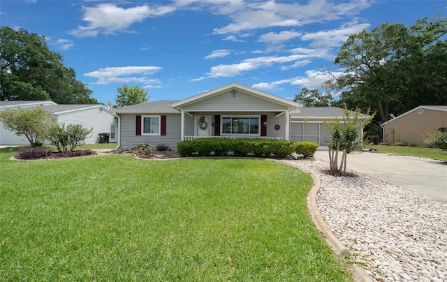 ranch-style home with a porch, concrete driveway, and a front yard