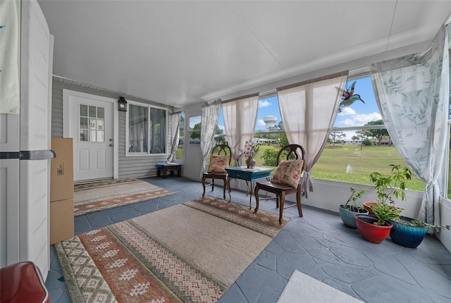sunroom featuring a healthy amount of sunlight