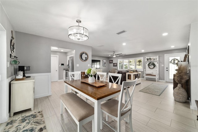 dining room featuring recessed lighting, visible vents, and ceiling fan with notable chandelier