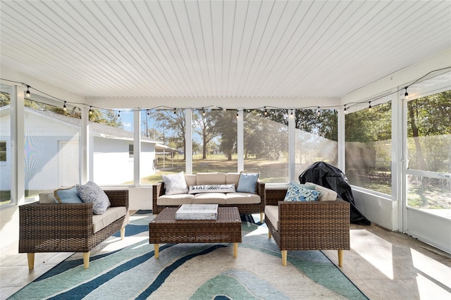 sunroom featuring a healthy amount of sunlight