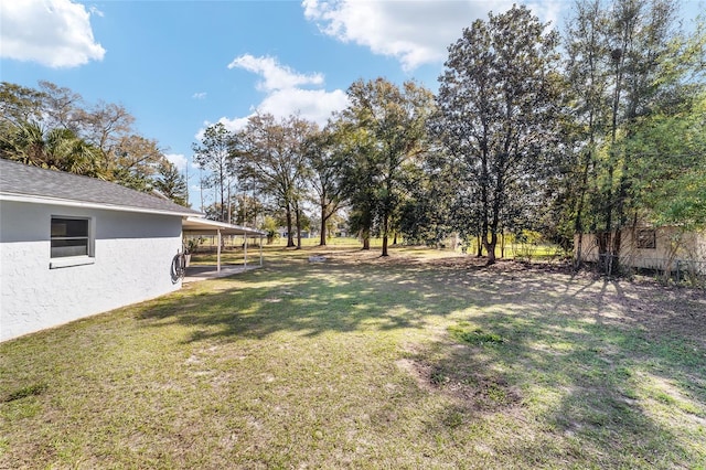 view of yard featuring fence