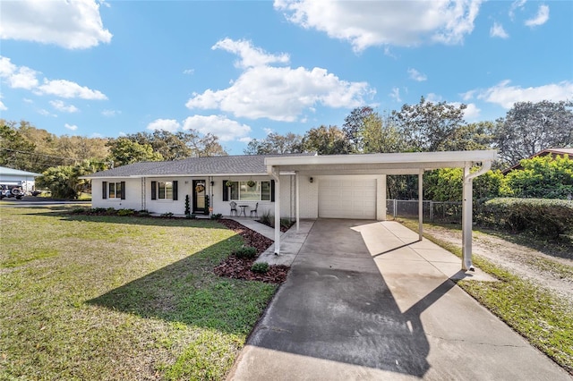 ranch-style home featuring a front yard, covered porch, driveway, and an attached garage