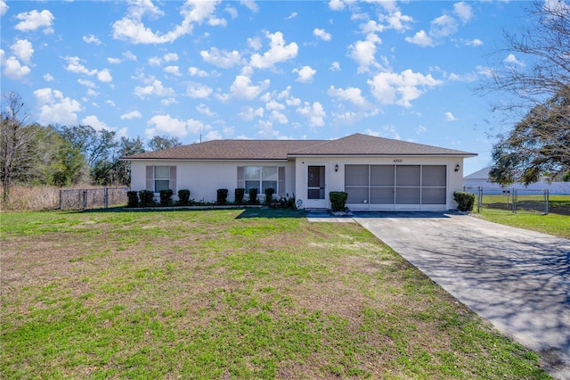 ranch-style house with a front yard and a garage