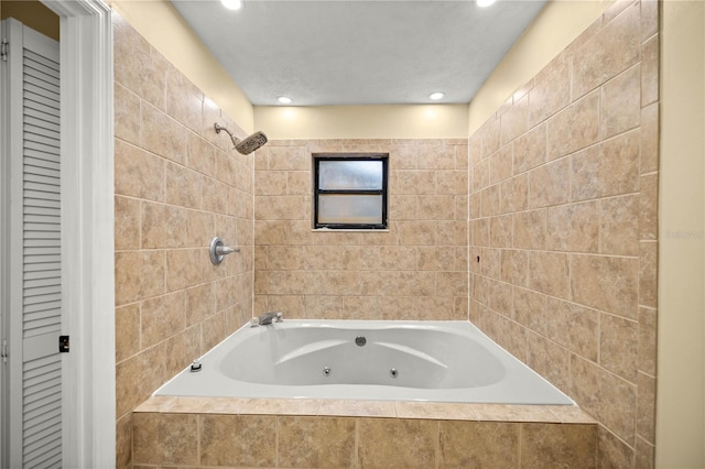 full bathroom featuring a shower, a tub with jets, and recessed lighting