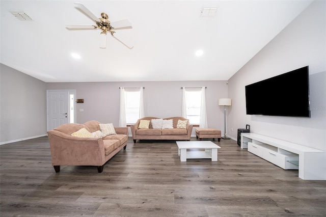 living room with dark wood-type flooring, lofted ceiling, and ceiling fan