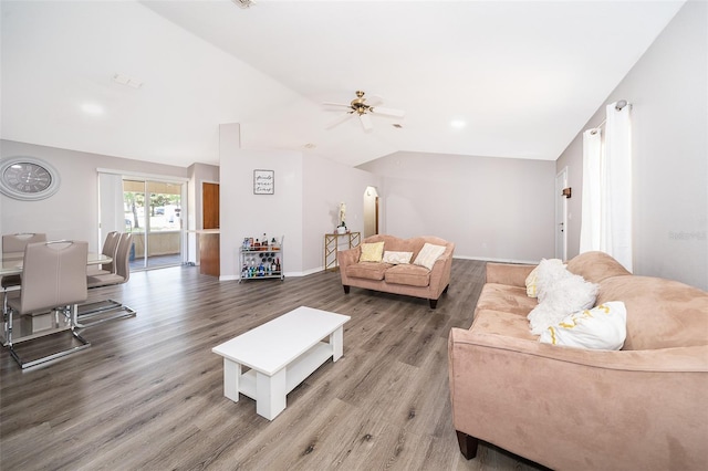 living room with hardwood / wood-style floors, lofted ceiling, and ceiling fan