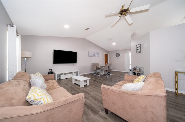 living room with ceiling fan, wood-type flooring, and lofted ceiling