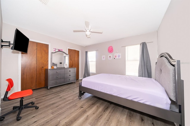 bedroom featuring ceiling fan and wood-type flooring