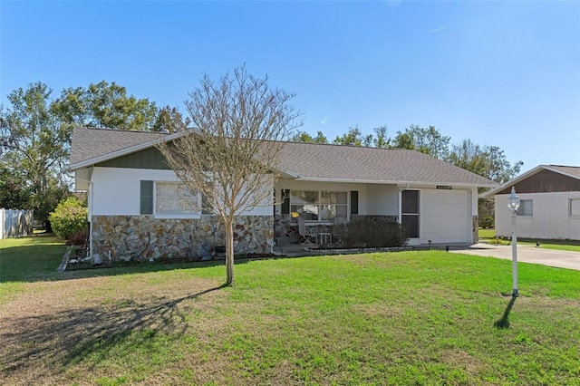 single story home featuring an attached garage, stone siding, concrete driveway, and a front yard