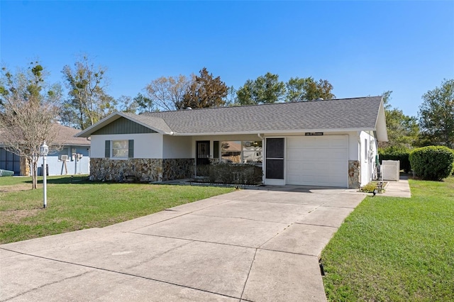 ranch-style home with driveway, stone siding, an attached garage, a front lawn, and stucco siding