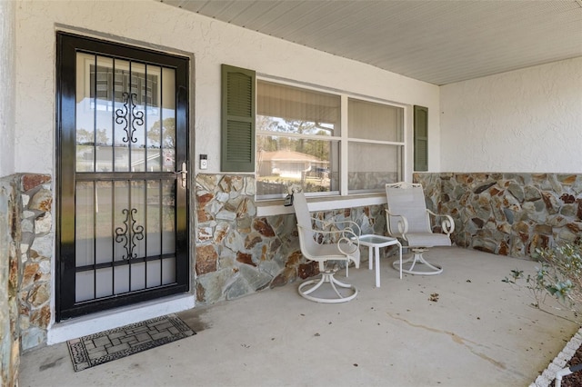 property entrance with a porch