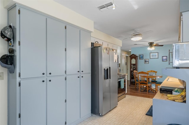 kitchen featuring appliances with stainless steel finishes and ceiling fan