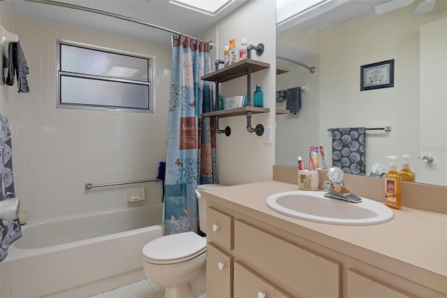 full bathroom featuring tile patterned flooring, vanity, toilet, and shower / tub combo