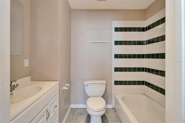 full bathroom featuring tile patterned floors, toilet, vanity, and tiled shower / bath combo