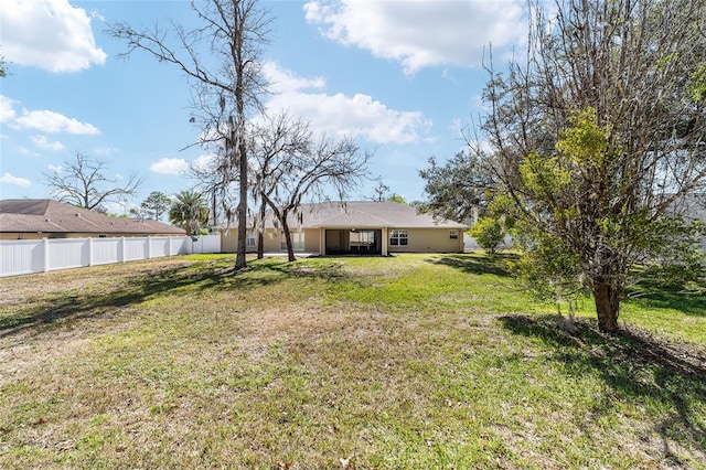 view of yard with fence