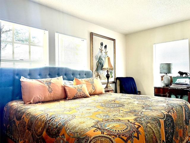 bedroom featuring a textured ceiling