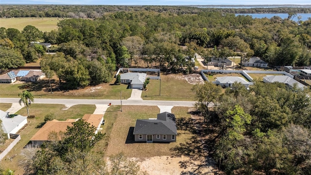 aerial view featuring a view of trees