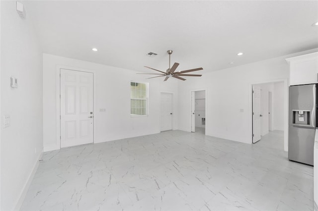 unfurnished room with recessed lighting, visible vents, baseboards, a ceiling fan, and marble finish floor