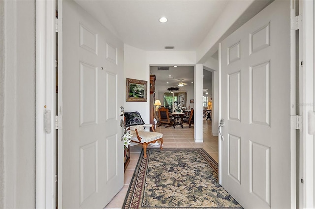 foyer entrance featuring recessed lighting, visible vents, ceiling fan, and light tile patterned floors