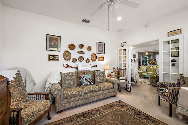 living area with ceiling fan, carpet, visible vents, and recessed lighting