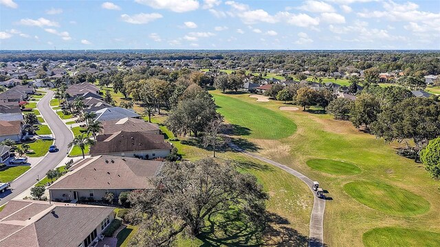 bird's eye view featuring view of golf course and a residential view