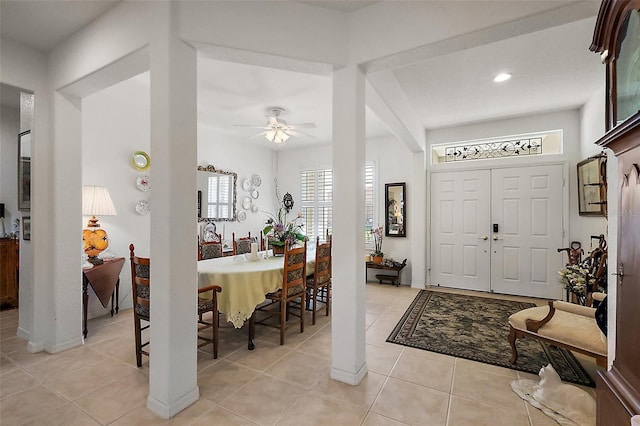 entryway with light tile patterned floors, baseboards, a ceiling fan, and recessed lighting