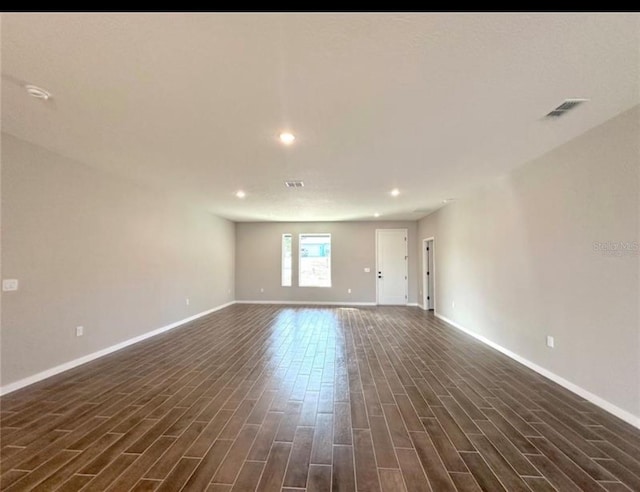 4501 SW 110th Ln, Ocala, FL 34476 - empty room featuring dark wood-style flooring and recessed lighting