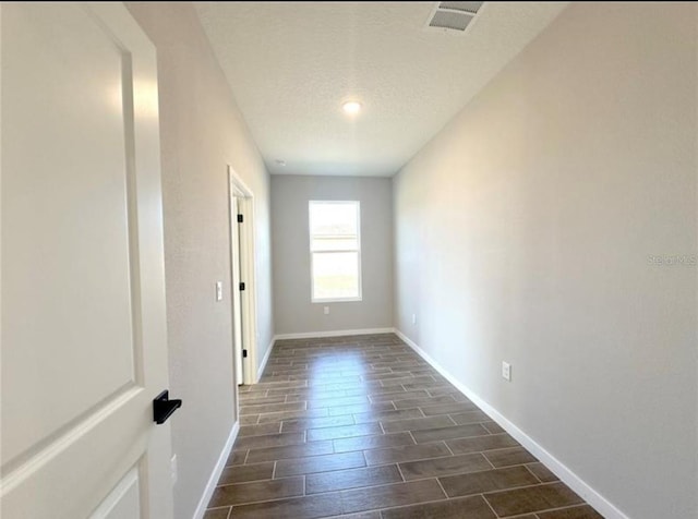4501 SW 110th Ln, Ocala, FL 34476 - empty room featuring baseboards and wood tiled floors