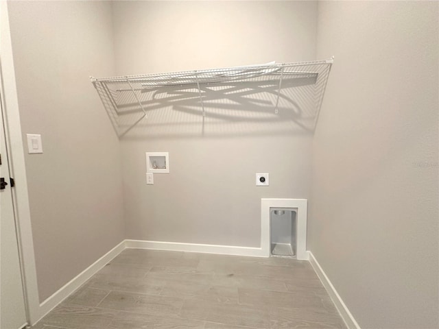 4501 SW 110th Ln, Ocala, FL 34476 - laundry room with washer hookup, hookup for an electric dryer, and light wood-type flooring