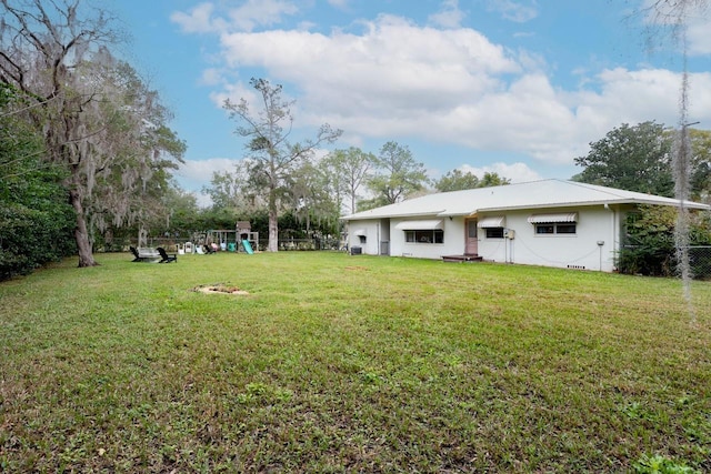 view of yard with a playground