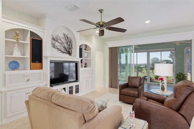 living room featuring visible vents, built in features, a ceiling fan, and light tile patterned flooring