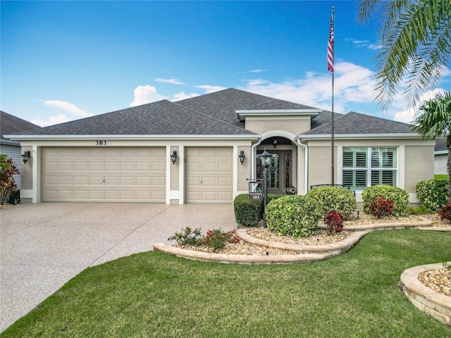 single story home featuring an attached garage, a front lawn, concrete driveway, and stucco siding